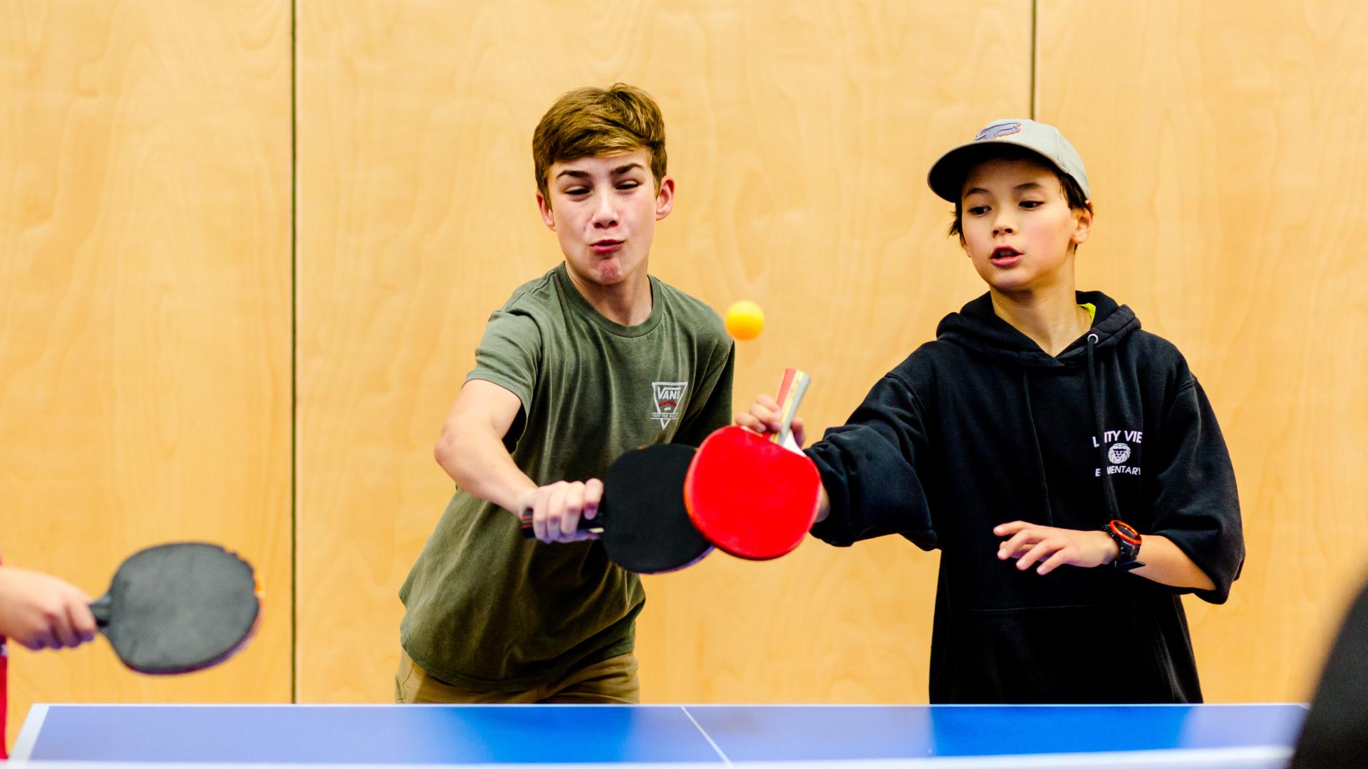 Preteen Boys Playing Table Tennis at Albion Community Centre
