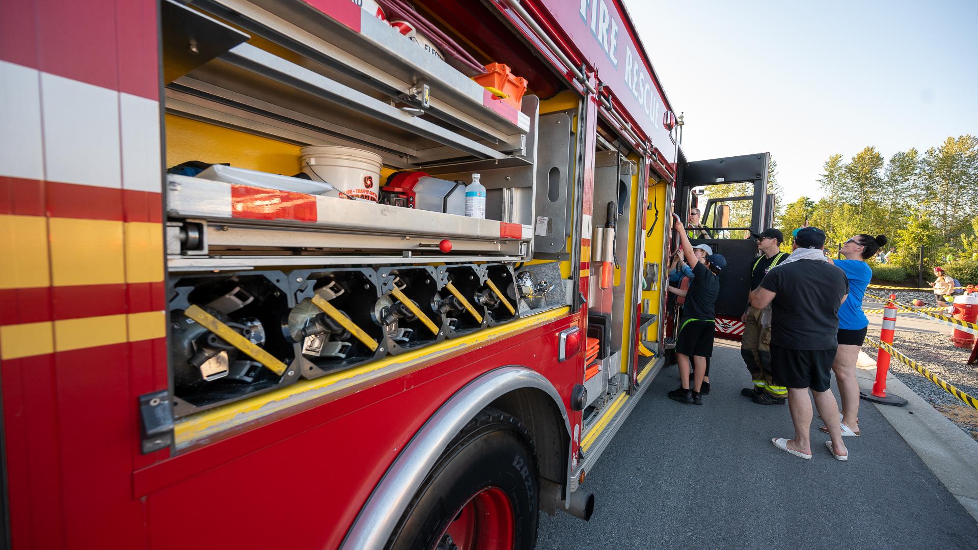 Parked firetruck showcasing exterior-facing tool storage.
