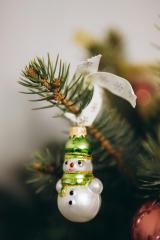 snowman ornament on a christmas tree