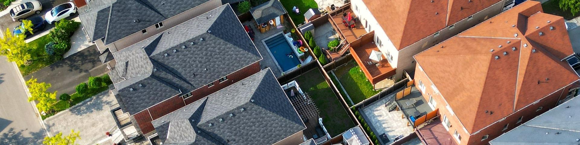 An aerial shot of a row of houses back to back.
