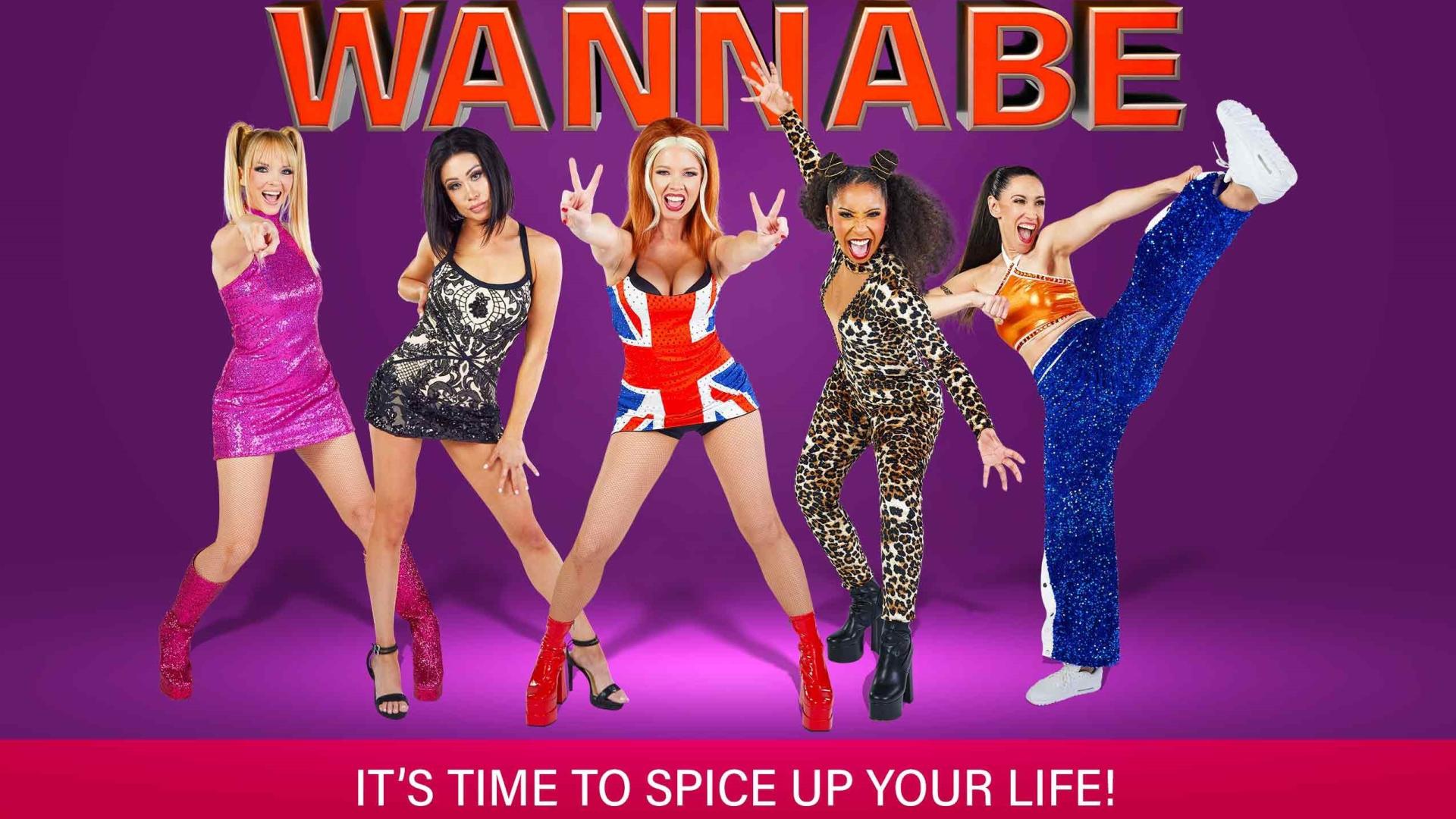 The Spice Wannabe performers strike poses in their Spice Girl tribute costumes.
