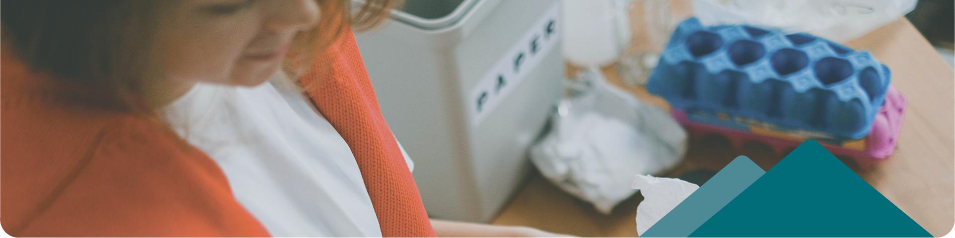 Woman Sorting Household Recycling