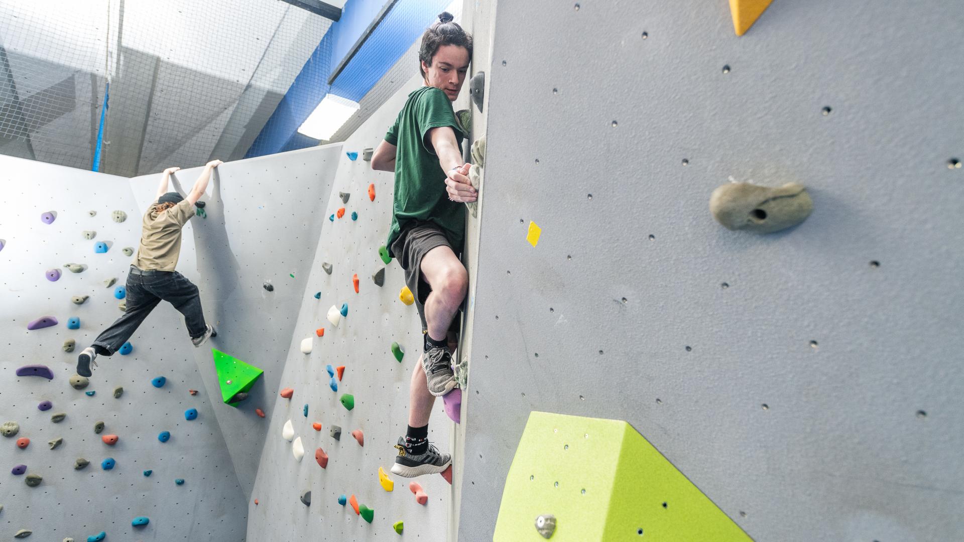 Youth on the Climbing Wall at Greg Moore Youth Centre