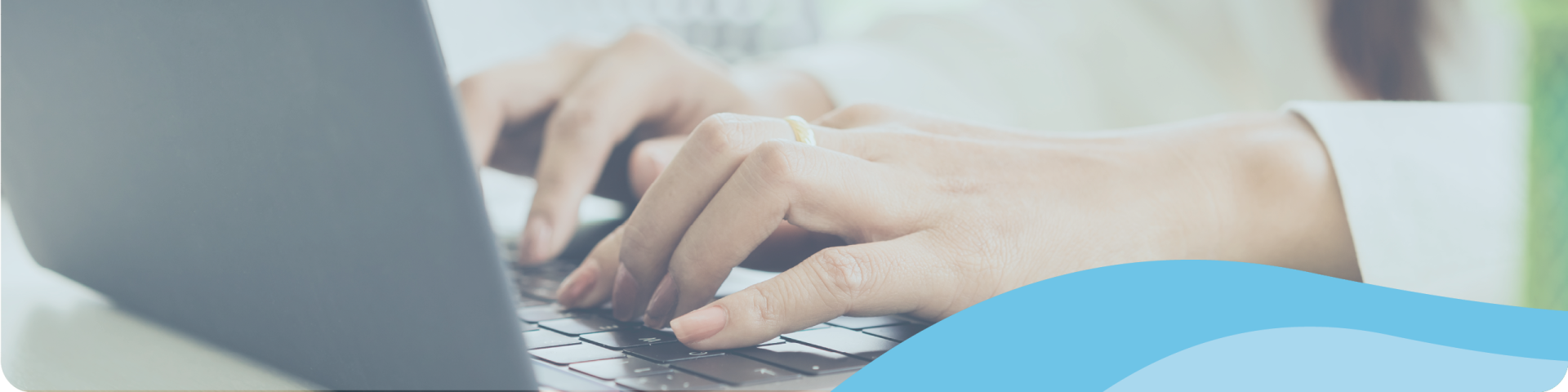 woman typing on laptop