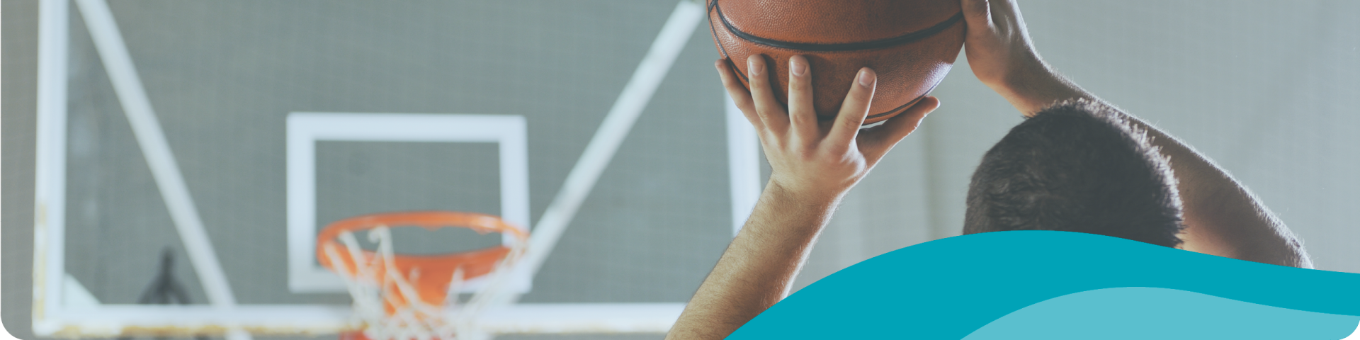 Teenager Getting Ready to Shoot a Basket with a Basketball