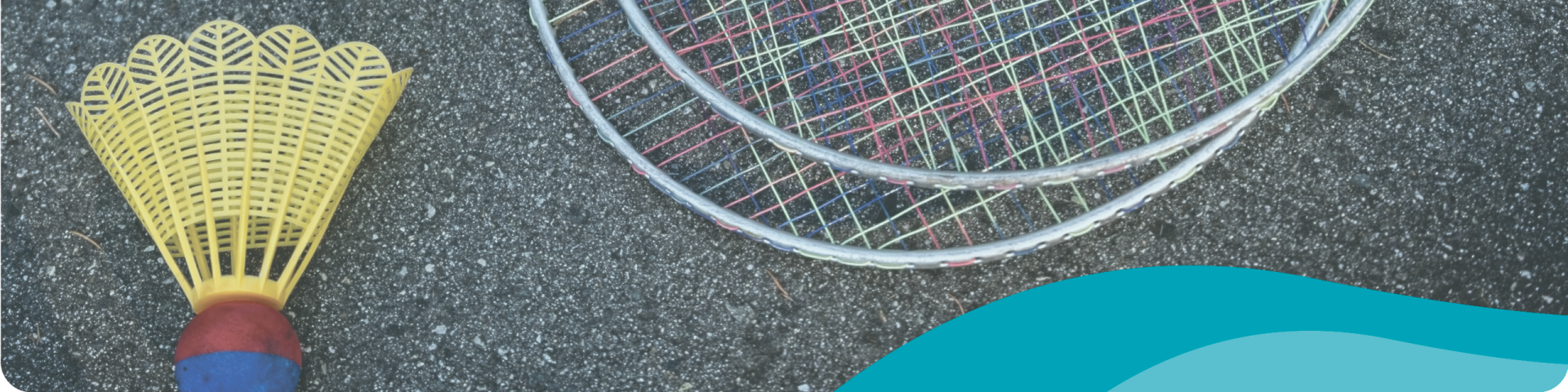 Badminton Racquets and a Yellow Birdie