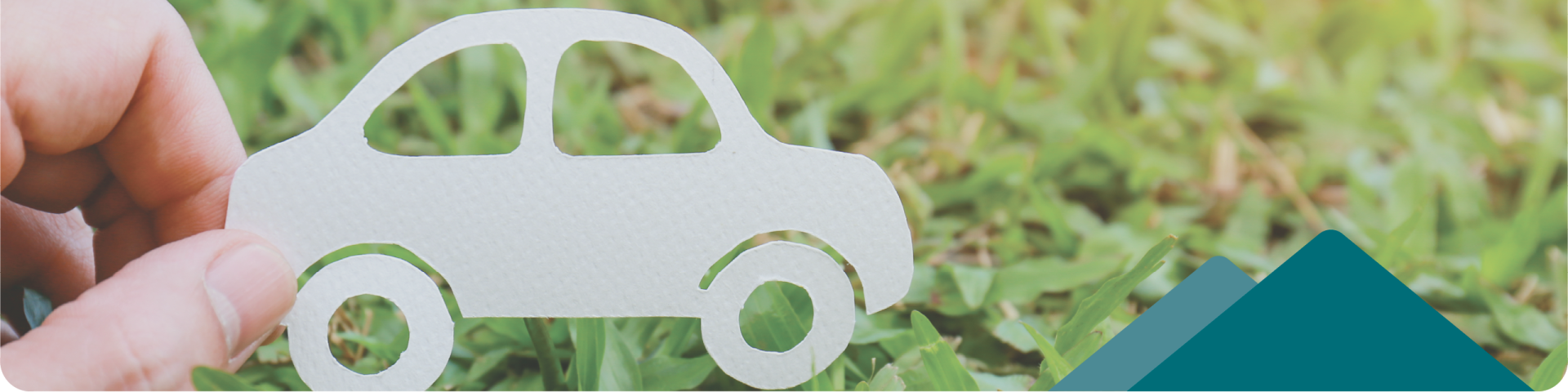 paper car on grass background
